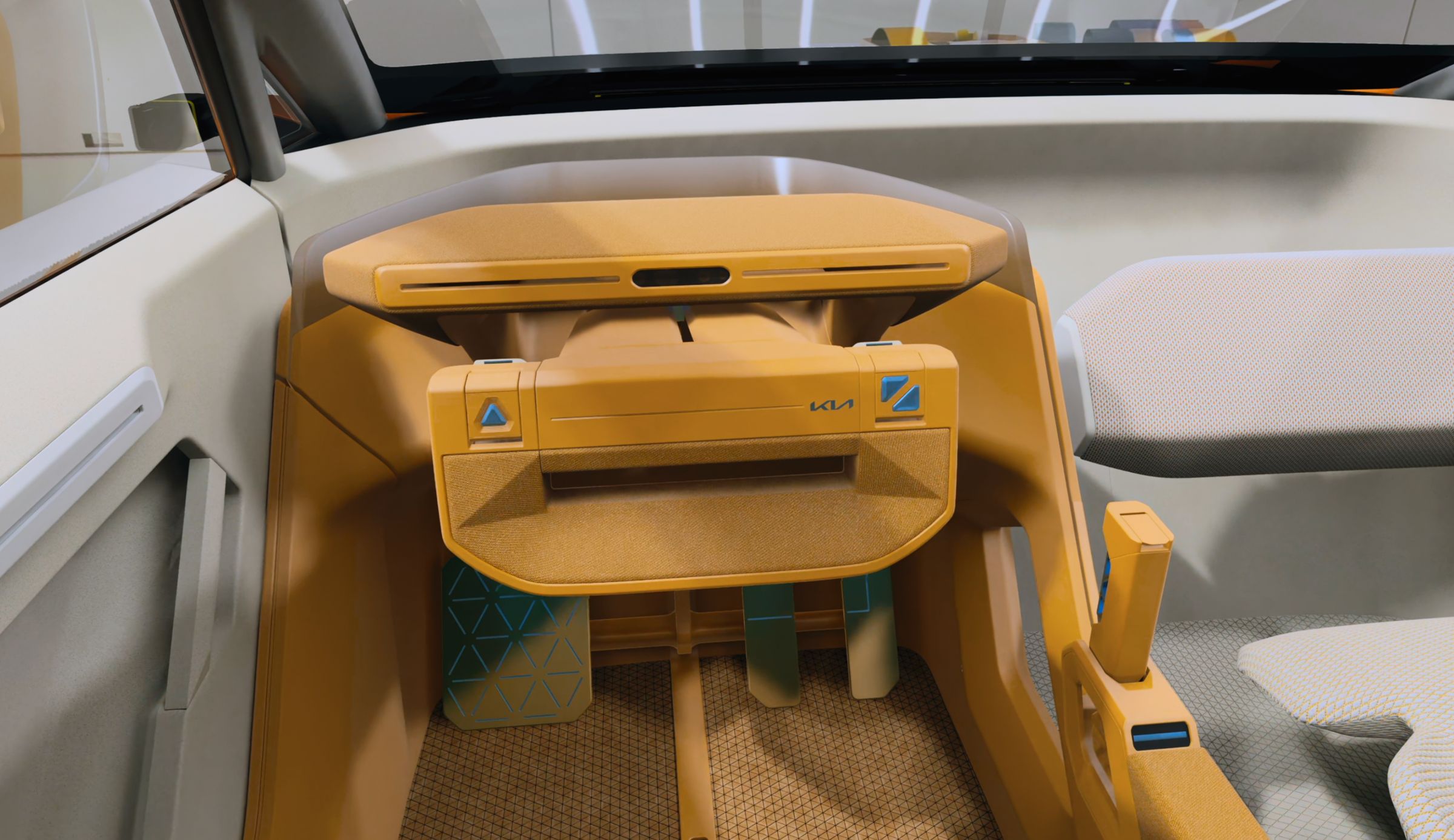 Designer in a seating buck wearing Apple Vision Pro with the virtual Kia interior anchored around them.